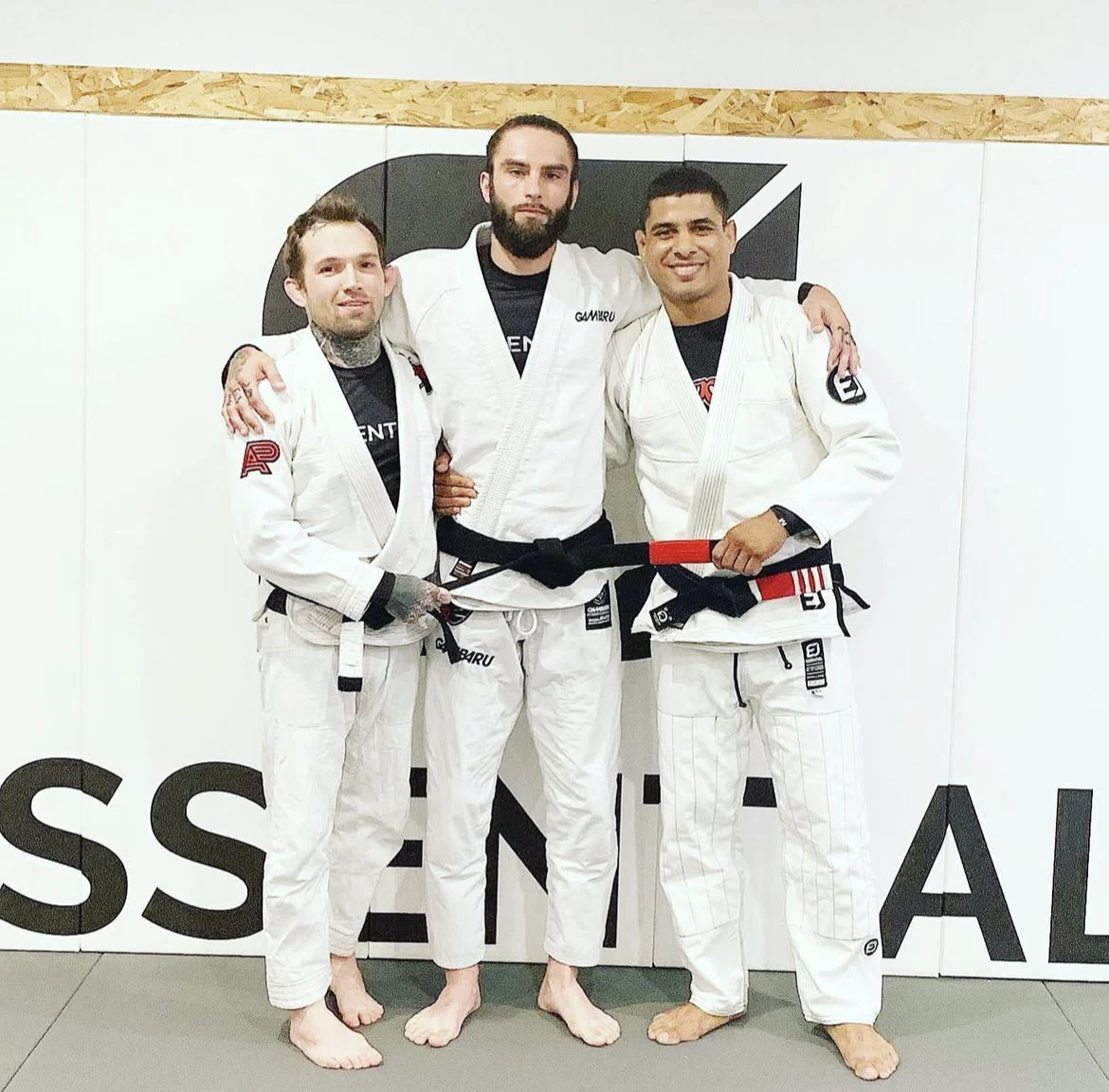 Dennis Pressey Jr. belt promotion with training partners